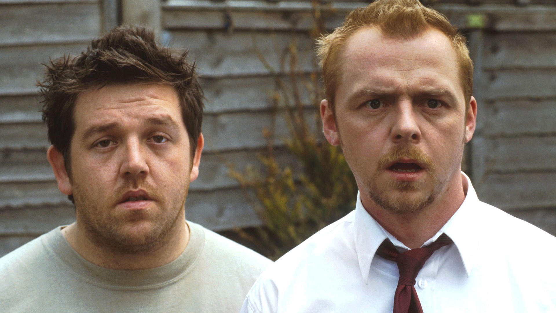 Star and co-writer Simon Pegg (r) as Shaun with Nick Frost (l) as his best friend Ed in Shaun of the Dead (2004)