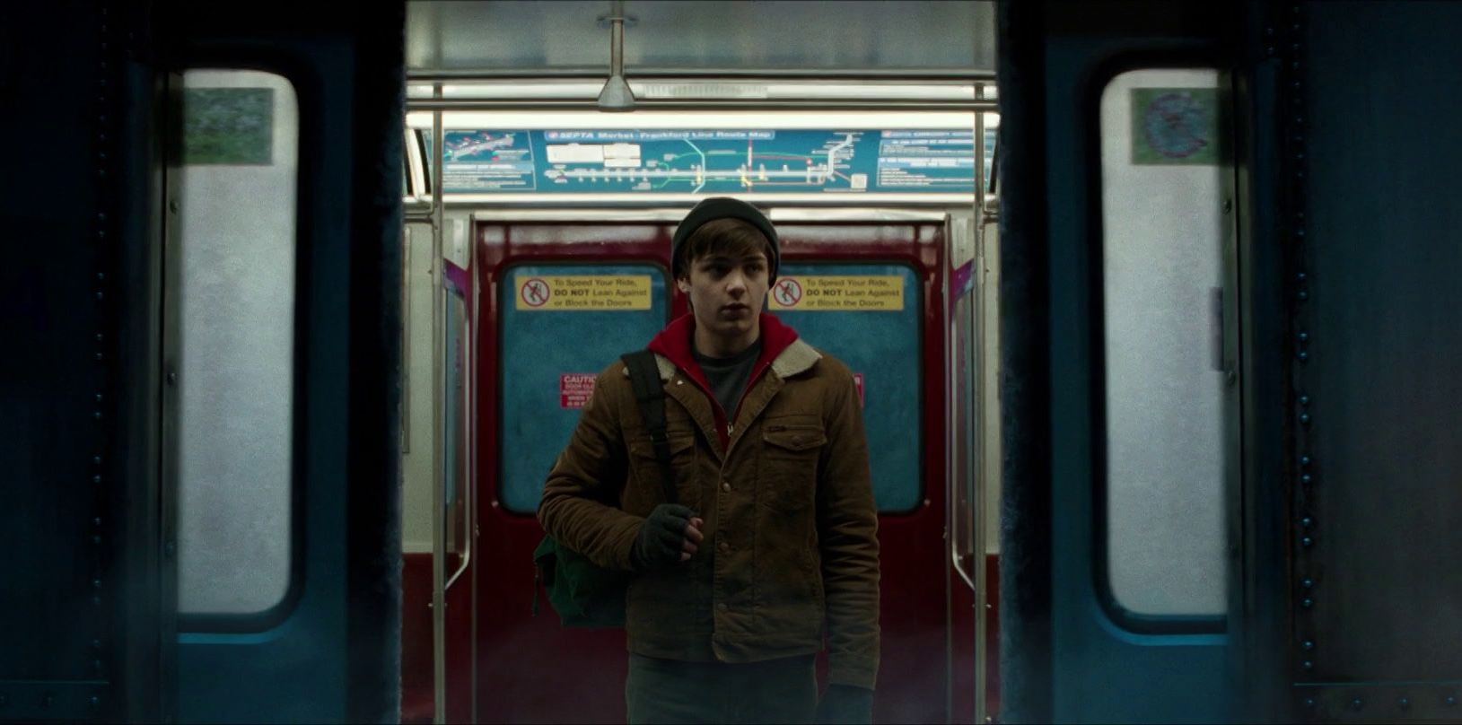 Billy Batson (Asher Angel) exists from a subway car into the Rock of Eternity in Shazam! (2019)