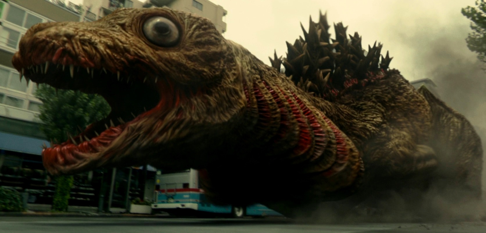 The initial larval form of Godzilla emerges into the streets in Shin Godzilla (2016)