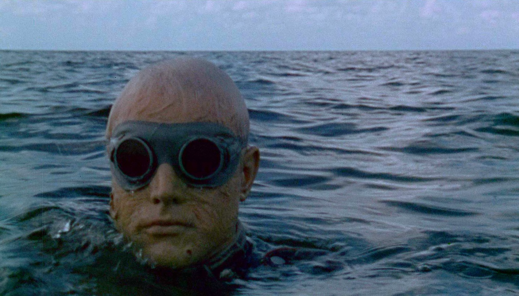 A Nazi zombie rises from the surf in Shock Waves (1977)