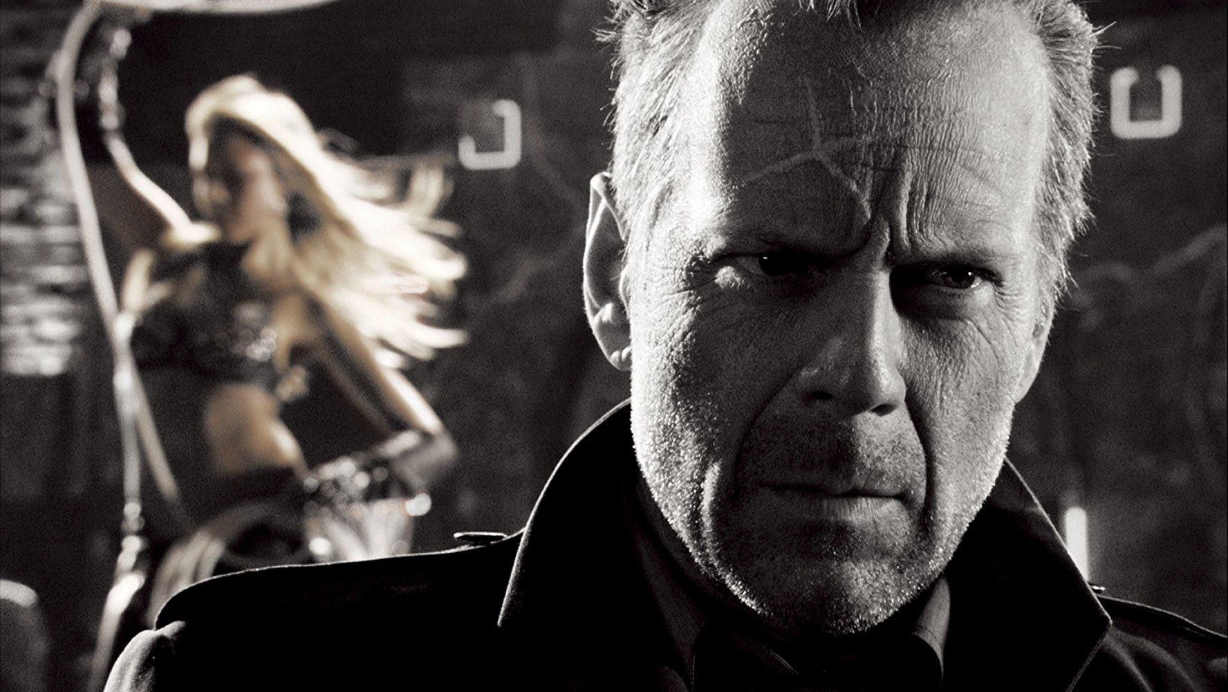 Bruce Willis as Detective John Hartigan in Sin City (2005)