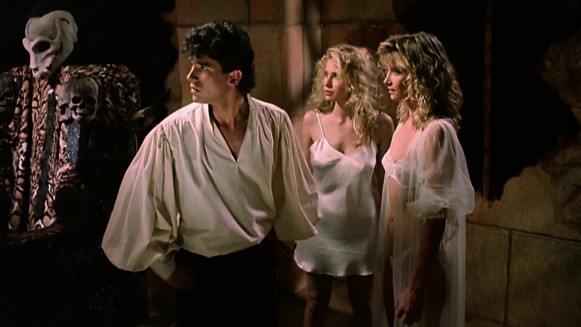 (l to r) Zed (Don Scribner), Dara (Elizabeth Cayton, later known as Elizabeth Kaitan) and Tisa (Cindy Beal) in Slave Girls from Beyond Infinity (1987)