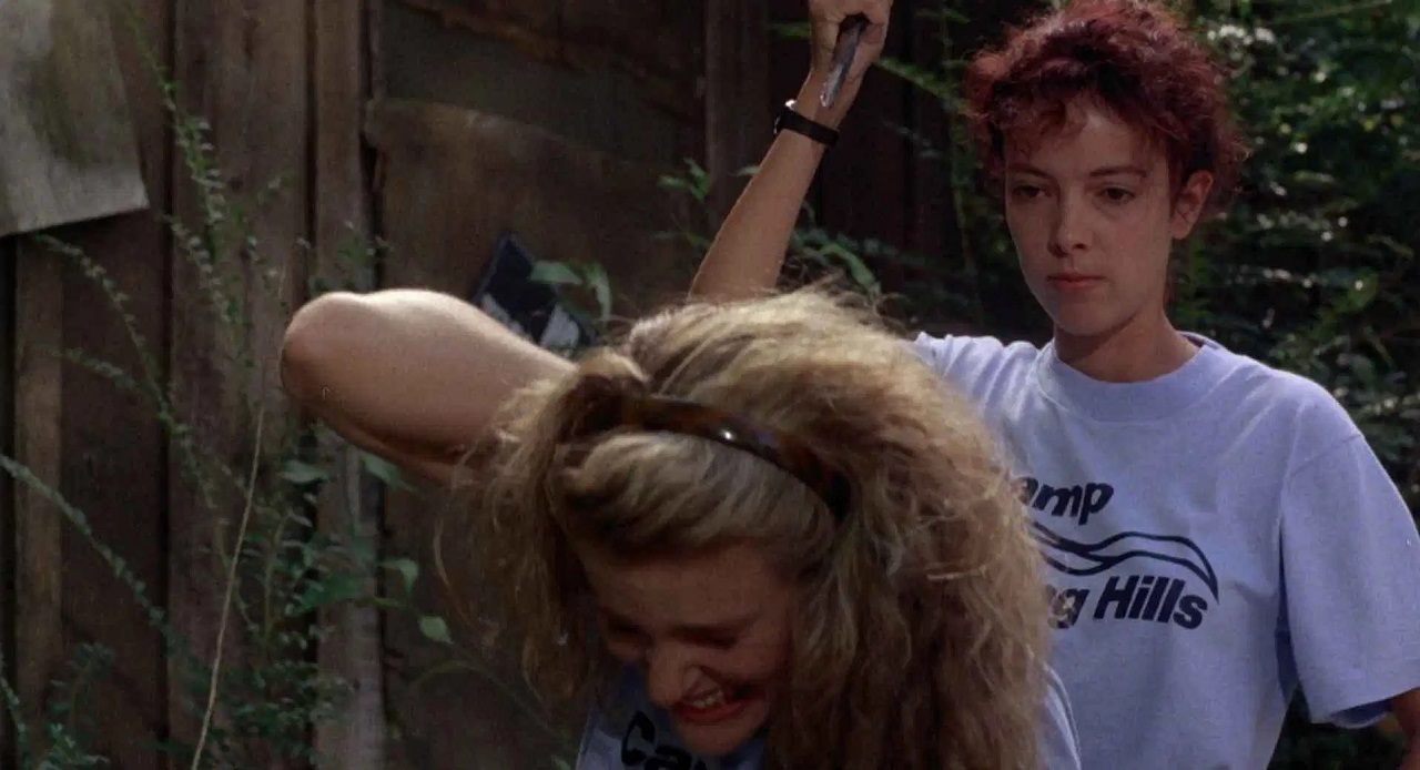 Angela (Pamela Springsteen) stabs Valerie Hartman in Sleepaway Camp 2: Unhappy Campers (1988)
