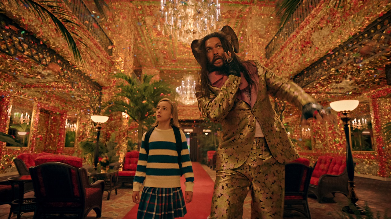 Nemo (Marlow Barkley) and Flip (Jason Momoa) enter the ballroom of butterflies in Slumberland (2022)