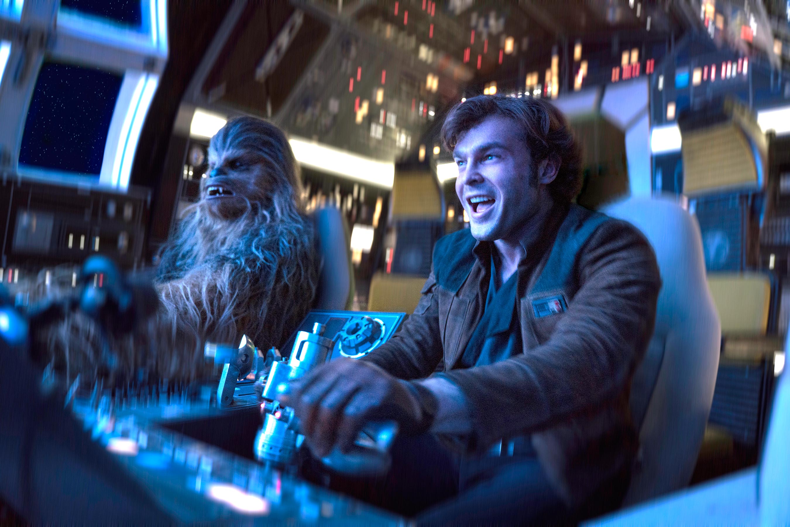 Chewbacca (Joonas Suotamo) and Han Solo (Alden Ehrenreich) pilot the Millennium Falcon for the first time in Solo: A Star Wars Story (2018)