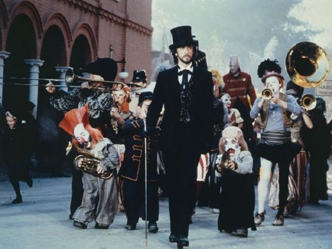 Dark's Pandemonium Carnival, led by Mr Dark (Jonathan Pryce), arrives in town in Something Wicked This Way Comes (1983)