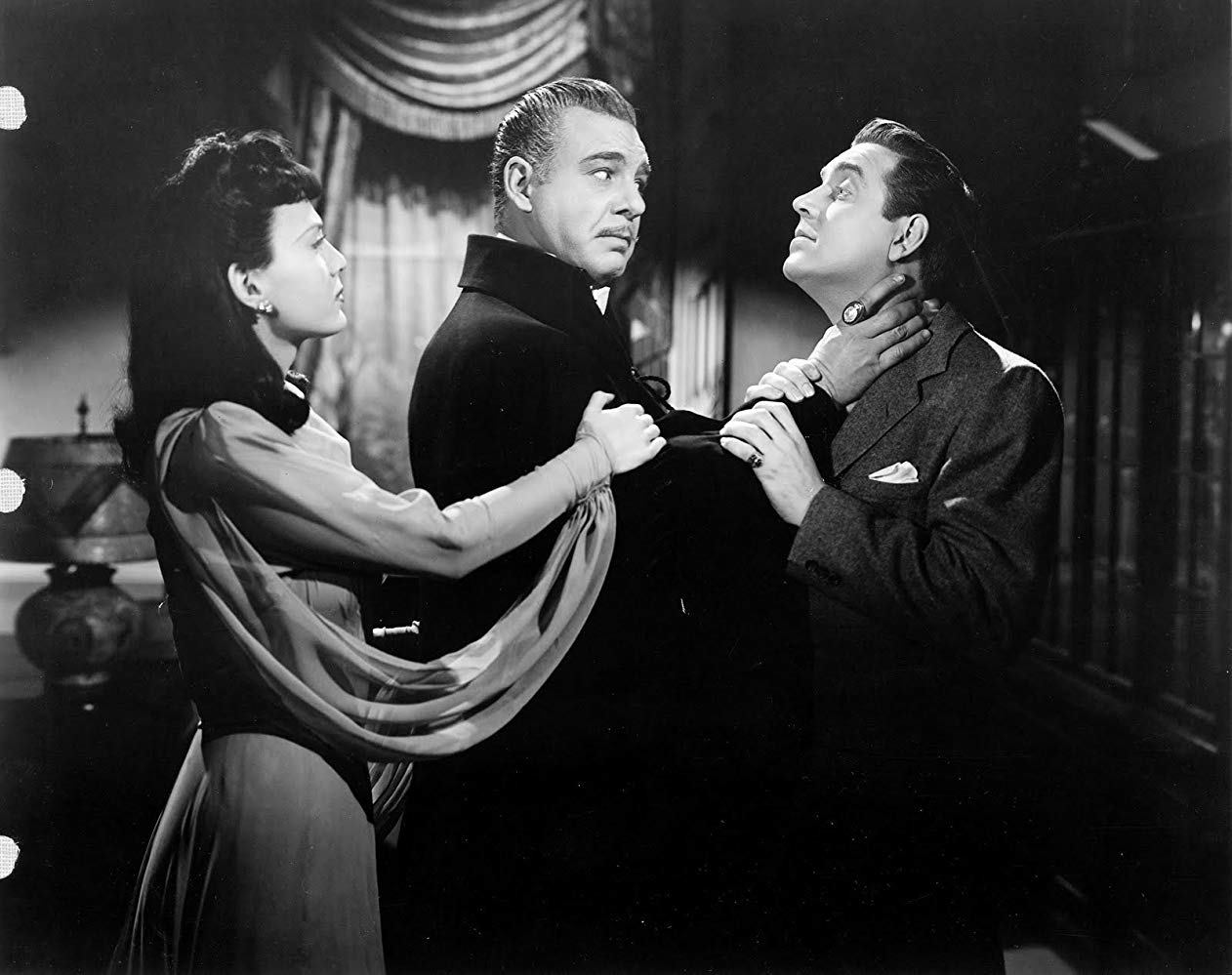 Louise Albritton tries to intervene as Dracula (Lon Chaney Jr) threatens romantic rival Robert Paige in Son of Dracula (1943)