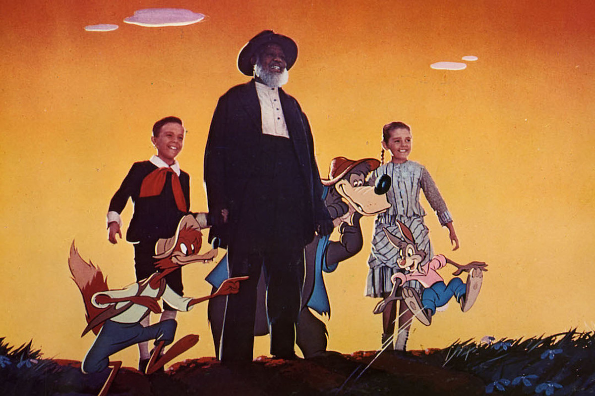 (l to r) Johnny (Bobby Driscoll), Uncle Remus (James Baskett) and Ginny (Luana Patten) accompanied by the animated Brer Fox, Brer Bear and Brer Rabbit in Song of the South (1946)