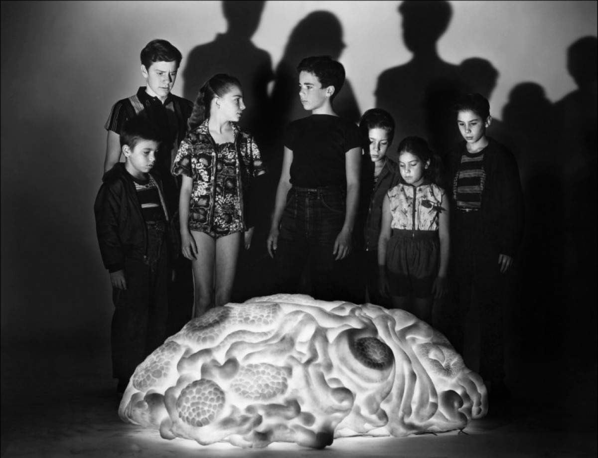 The children gathered around the alien blob in The Space Children (1958)