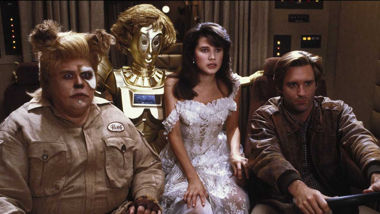 Barf (John Candy), Dot Matrix (Lorene Yarnell, voiced by Joan Rivers), Princess Vespa (Daphne Zuniga) and Lone Starr (Bill Pullman) in Spaceballs (1987)