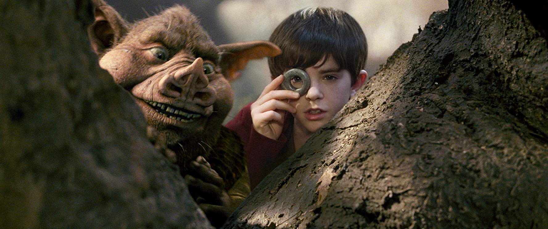 Freddie Highmore and the goblin Hogsqueal in The Spiderwick Chronicles (2008)