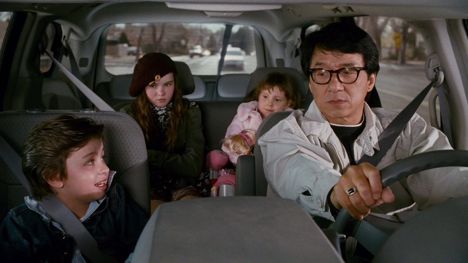 Jackie Chan and his young charges Will Shadley, Madeline Carroll and Alina Foley in The Spy Next Door (2010)
