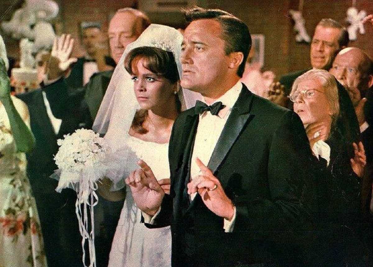 Napoleon Solo (Robert Vaughn) forced into a shotgun wedding to Letitia Roman in The Spy in the Green Hat (1967)