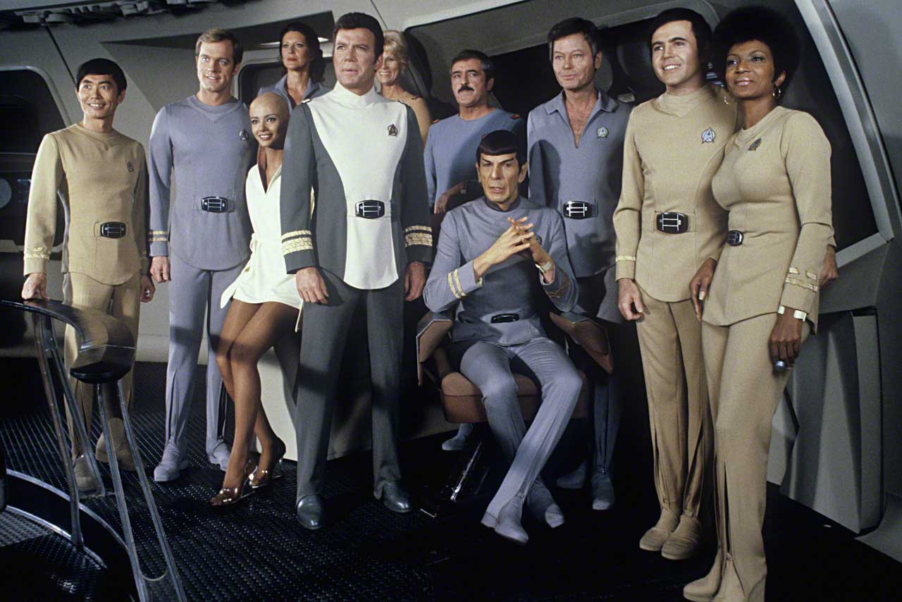 Cast line-up - Sulu (George Takei), Willard Decker (Stephen Collins), Lieutenant Ilia (Persis Khambatta), Christine Chapel (Majel Barrett), Admiral Kirk (William Shatner), Janice Rand (Grace Lee Whitney), Mr Scott (James Doohan), Spock (Leonard Nimoy), Dr McCoy (DeForest Kelley), Chekov (Walter Koenig) and Uhura (Nichelle Nichols) in Star Trek - The Motion Picture (1979)