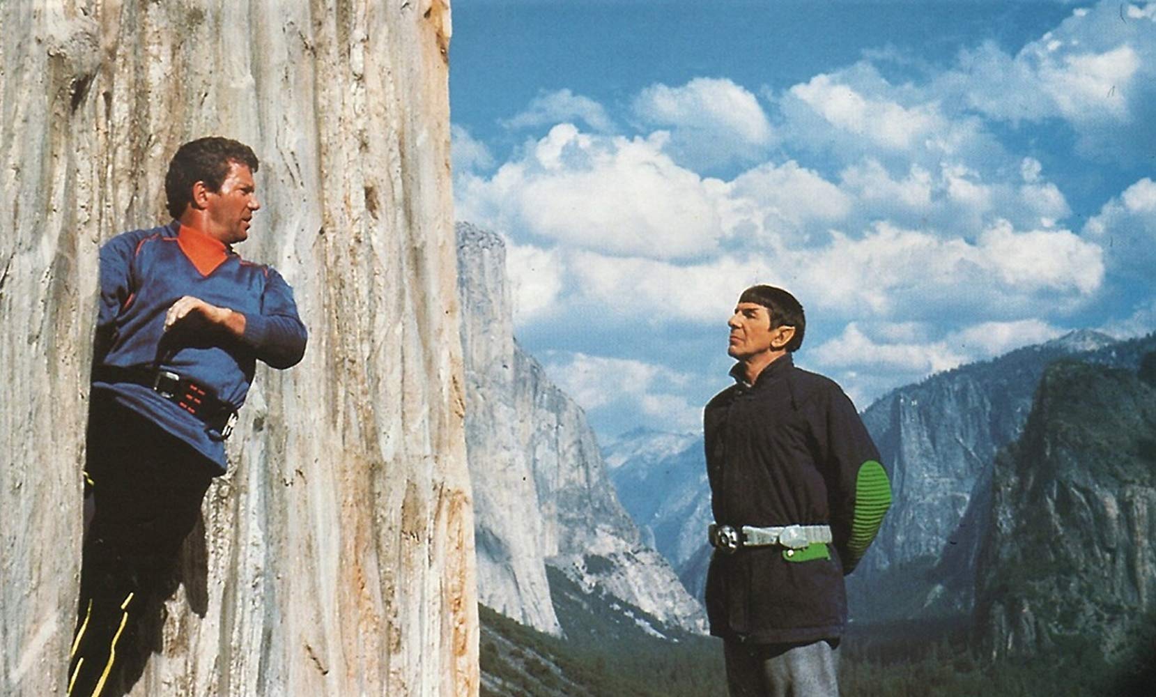 Spock (Leonard Nimoy) wearing jetboots comes to Captain Kirk (William Shatner)'s aid as he climbs El Capitane in Star Trek V: The Final Frontier (1989)