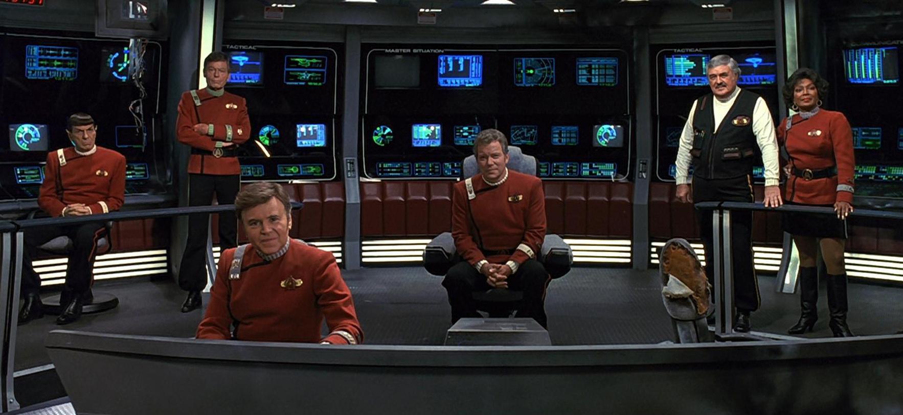 The Enterprise crew together again for one last outing - Mr Spock (Leonard Nimoy), Dr McCoy (DeForest Kelley), Chekov (Walter Koeenig), Captain Kirk (William Shatner), Mr Scott (James Doohan) and Uhura (Nichelle Nichols) in Star Trek VI: The Undiscovered Country (1991)