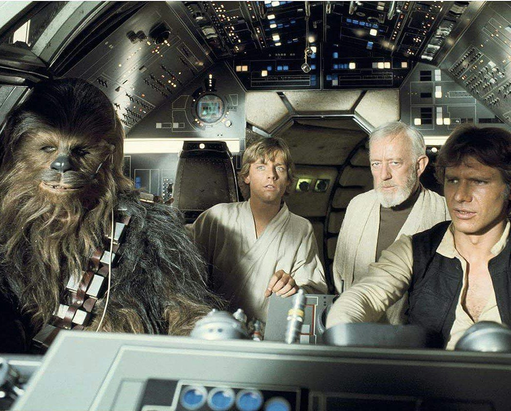 Aboard the Millennium Falcon - (l to r) Chewbacca (Peter Mayhew), Luke Skywalker (Mark Hamill), Obi-wan Kenobi (Alec Guinness) and Han Solo (Harrison Ford)