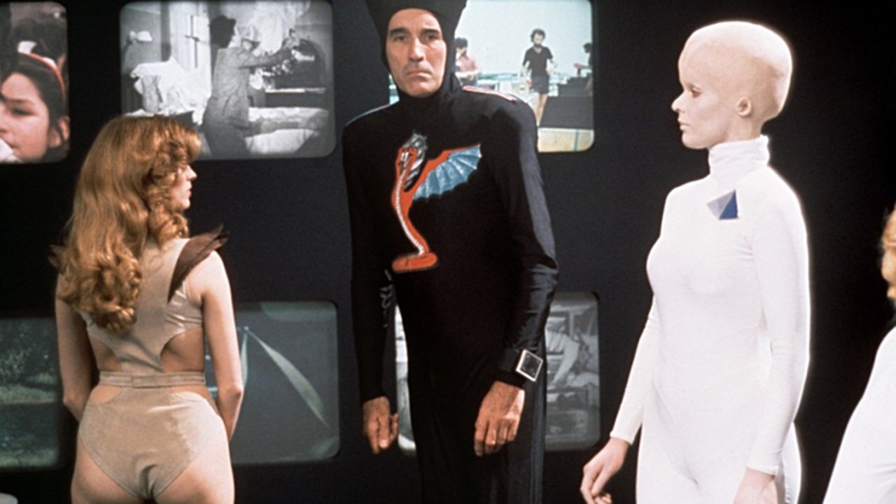 Aliens wars on Earth - (l ro r) Gezeth (Victoria Johnson), Captain Ramses (Christopher Lee) and Phi (Tiiu Leek) in Starship Invasions (1977)