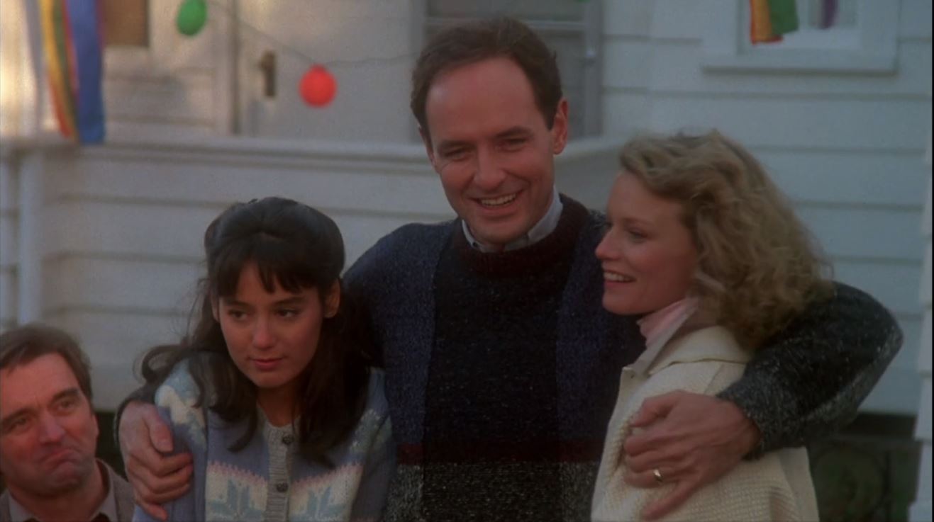 Stepfather Terry O'Quinn surrounded by his ideal family stepdaughter Jill Schoelen (l) and wife Shelley Hack (r) in The Stepfather (1987)