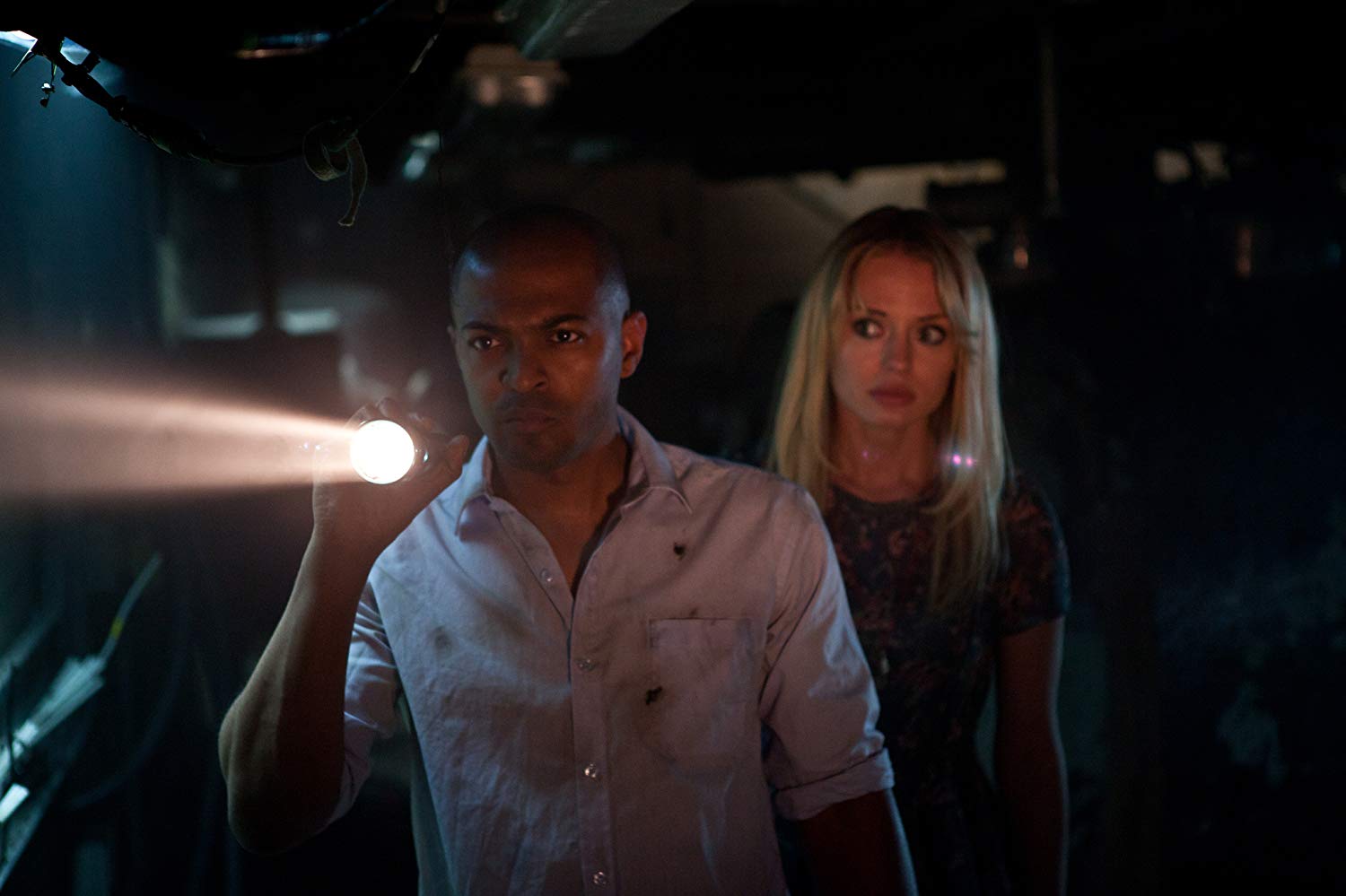 Noel Clarke and Laura Haddock in Storage 24 (2012)