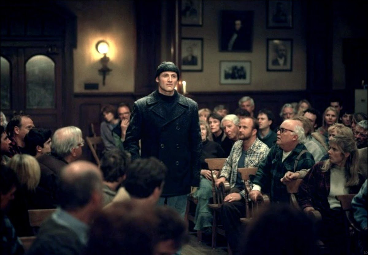 Linoge (Colm Feore) approaches the town hall meeting with his Faustian deal in Storm of the Century (1999)