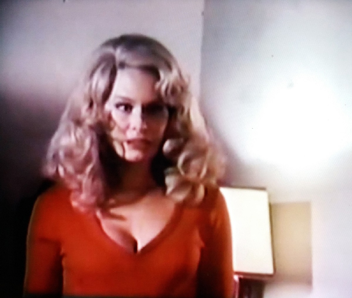 Karen Black as the possessed Miriam Oliver in red dress in The Strange Possession of Mrs Oliver (1977)