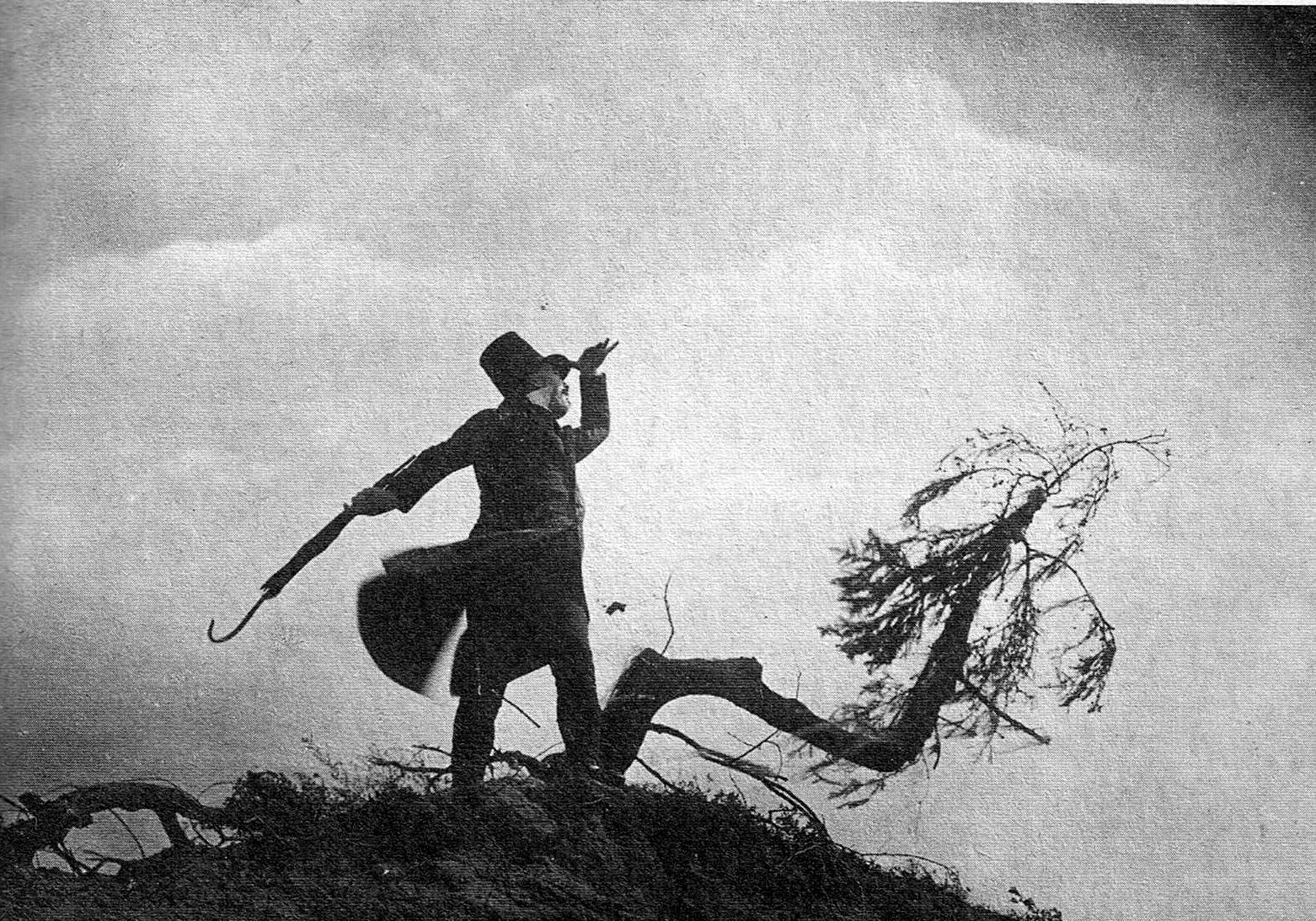 Scapinelli (Werner Krauss) stands on the hillside in The Student of Prague (1926)