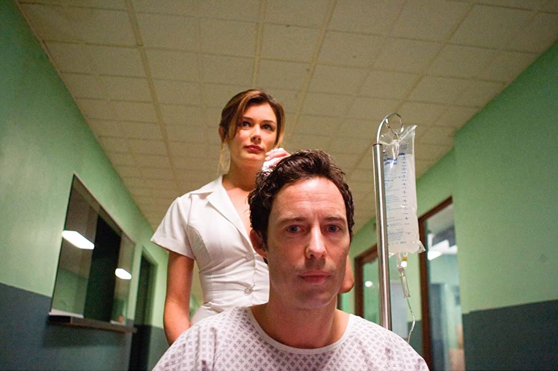 Tom Cavanagh is wheeled away by nurse Katherine Cunningham-Eves in Sublime (2007)