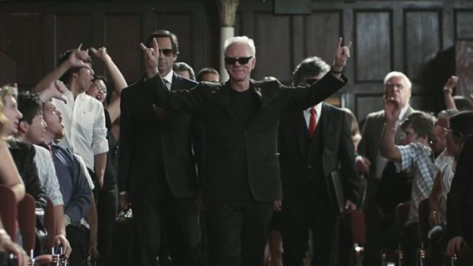 Satan (Malcolm McDowell) arrives at the court in Suing the Devil (2011)
