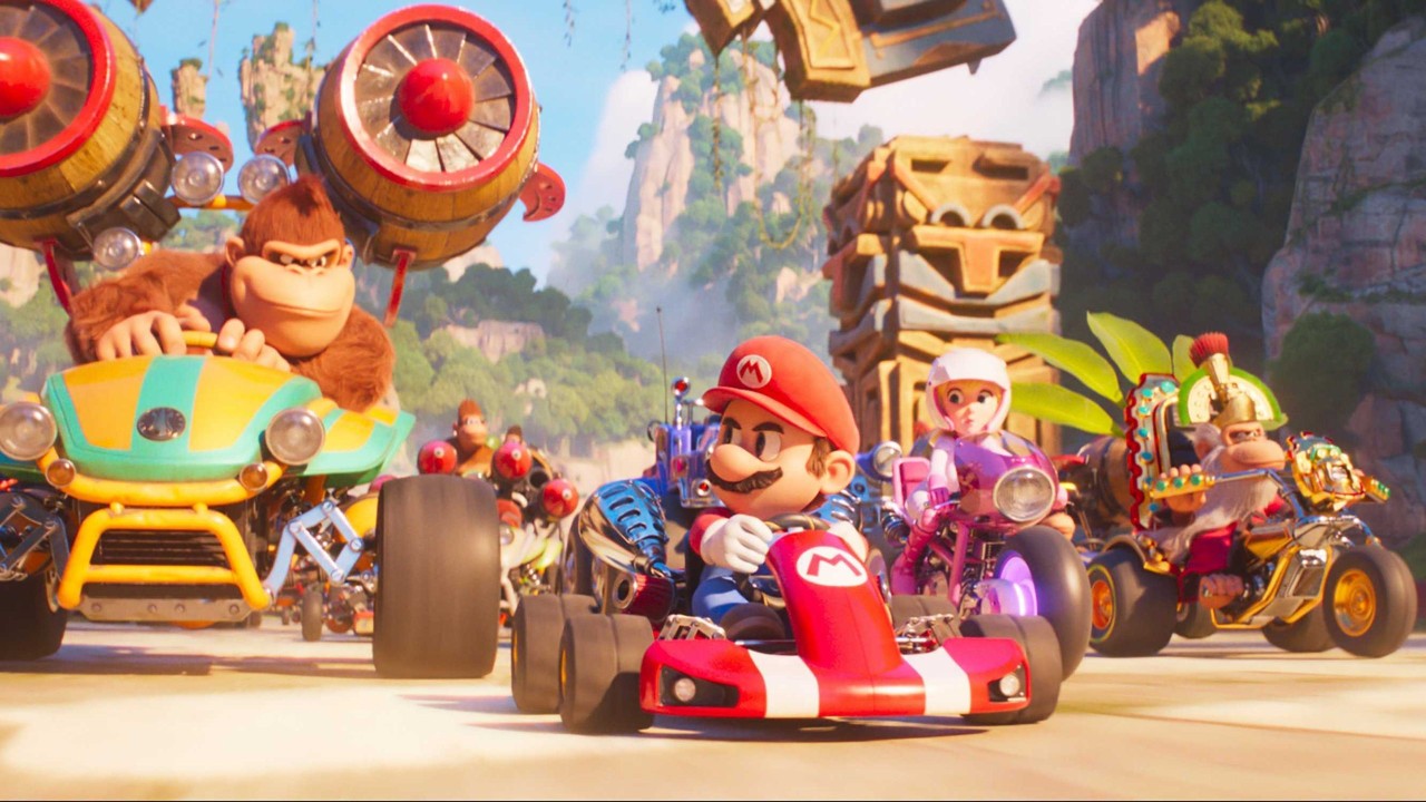 Donkey Kong (Seth Rogen), Mario (Chris Pratt), Princess Peach (Anya Taylor-Joy) and Cranky Kong (Fred Armisen) go go-kart racing in The Super Mario Bros. Movie (2023)