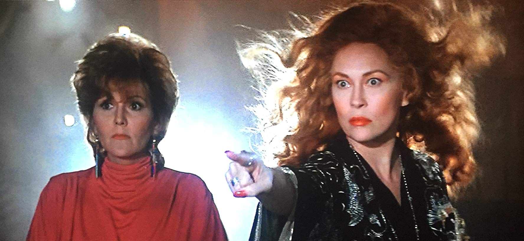 A madly overacting Faye Dunaway as the witch Selena (r) and her assistant Brenda Vaccaro (l) in Supergirl (1984)