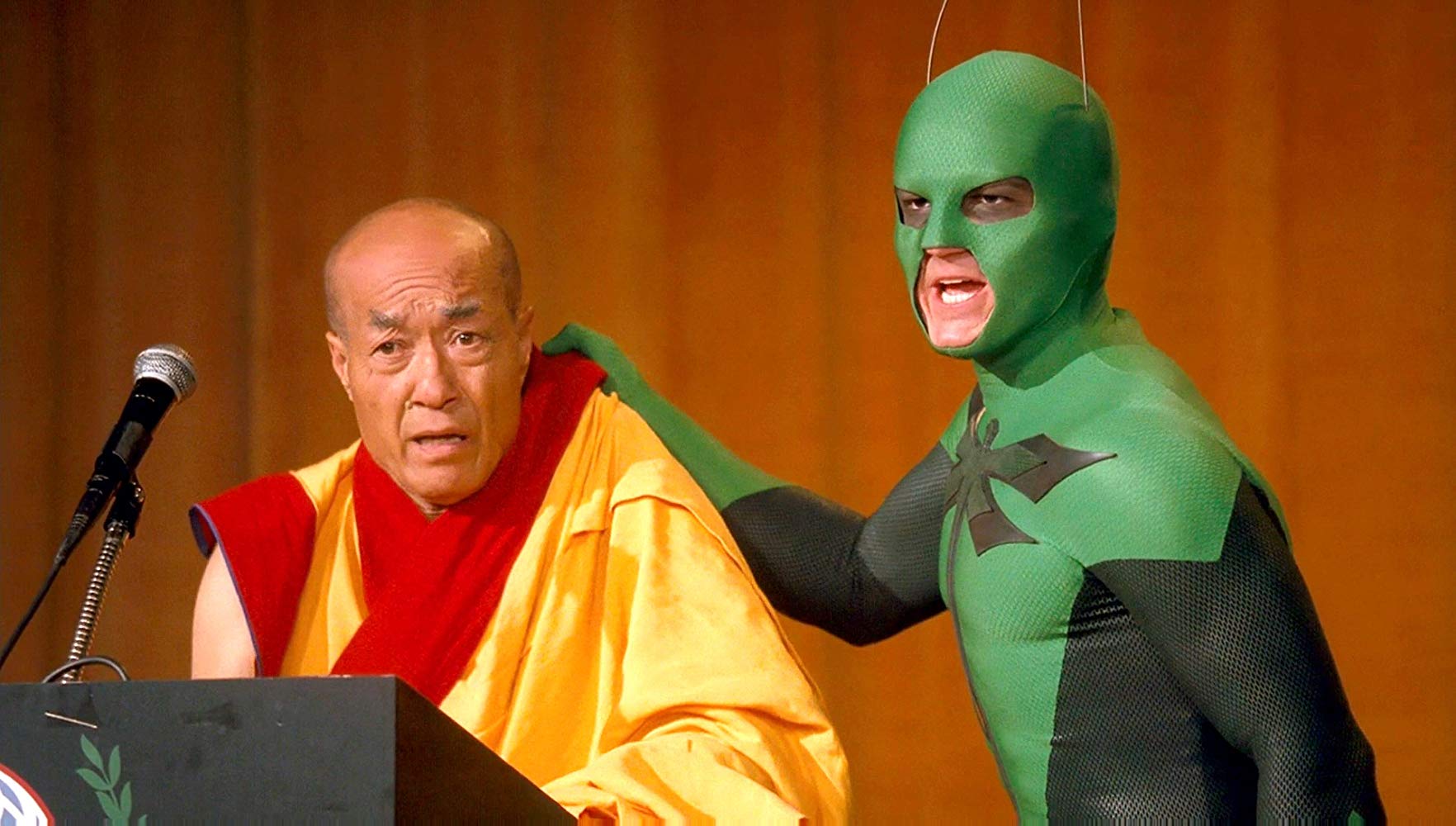 The Dragonfly (Drake Bell) apprehends the Dalai Lama in Superhero Movie (2008)