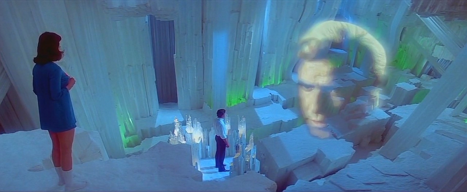 Lois Lane (Margot Kidder), Superman (Christopher Reeve) and the hologram Jor-el (Marlon Brando) at the Fortress of Solitude in Superman II The Richard Donner Cut (2006)