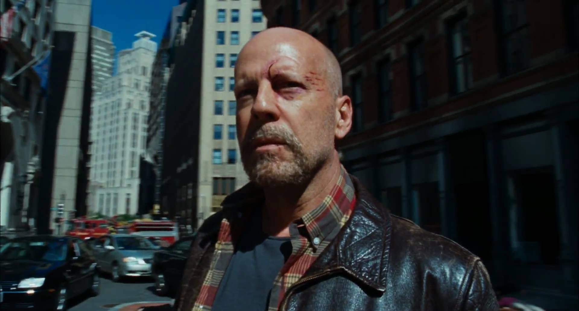 The middle-aging Bruce Willis emerges to deal with the real world in Surrogates (2009)