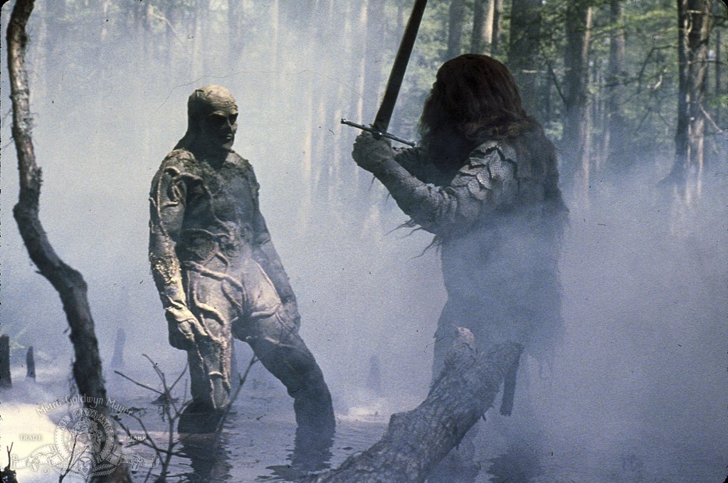 Swamp Thing (Dick Durock) faces down against the transformed Arcane in Swamp Thing (1982)