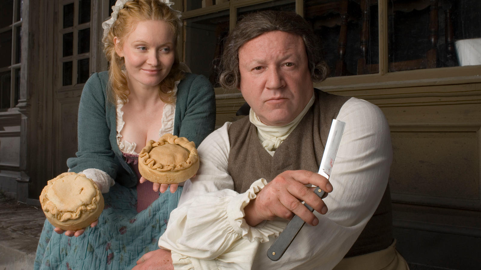 Sweeney Todd (Ray Winstone) and Mrs Lovett (Essie Davis) in Sweeney Todd (2006)