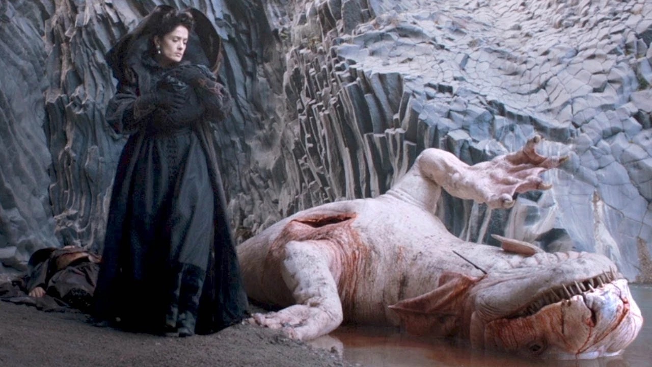 The Queen of Selvascura (Salma Hayek) by the slain sea monster in The Queen episode of Tale of Tales (2015)