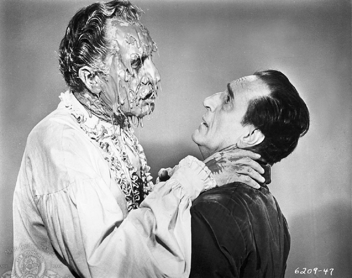 Valdemar (Vincent Price) undergoes gooey meltdown and attacks hypnotist Basil Rathbone after being kept alive in a hypnotic state following death in The Case of M. Valdemar episode from Tales of Terror (1962)