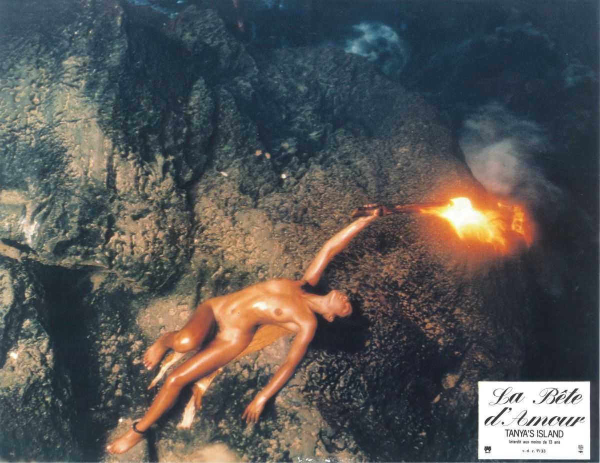 Tanya (D.D. Winters aka Vanity) languishes in the ape's grotto in Tanya's Island (1980)