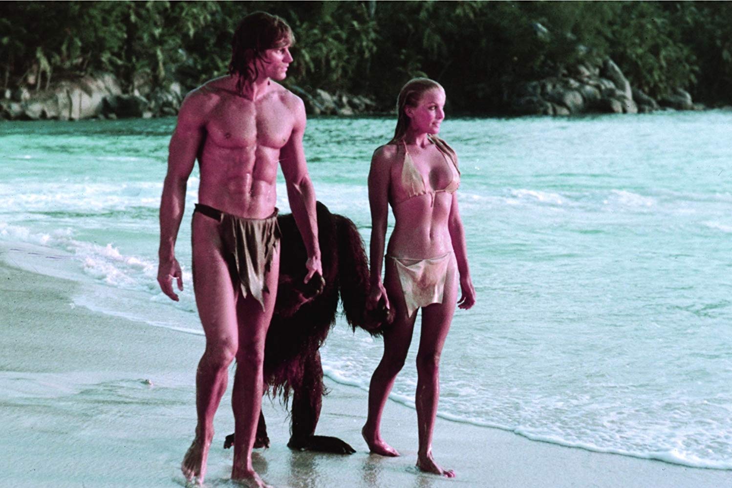Tarzan (Miles O’Keeffe) and Jane (Bo Derek) with Cheeta amid the beautiful Sri Lankan locations in Tarzan the Ape Man (1981)