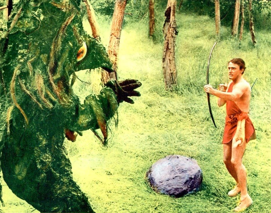 Teenage Caveman Robert Vaughn fights off a monster in Teenage Caveman (1958)