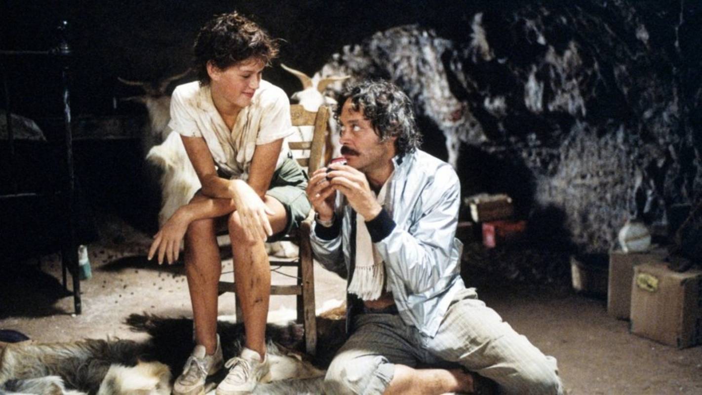 Miranda (Molly Ringwald) and the goatherd Kalibanos (Raul Julia), the film's equivalent of Caliban in Tempest (1982)