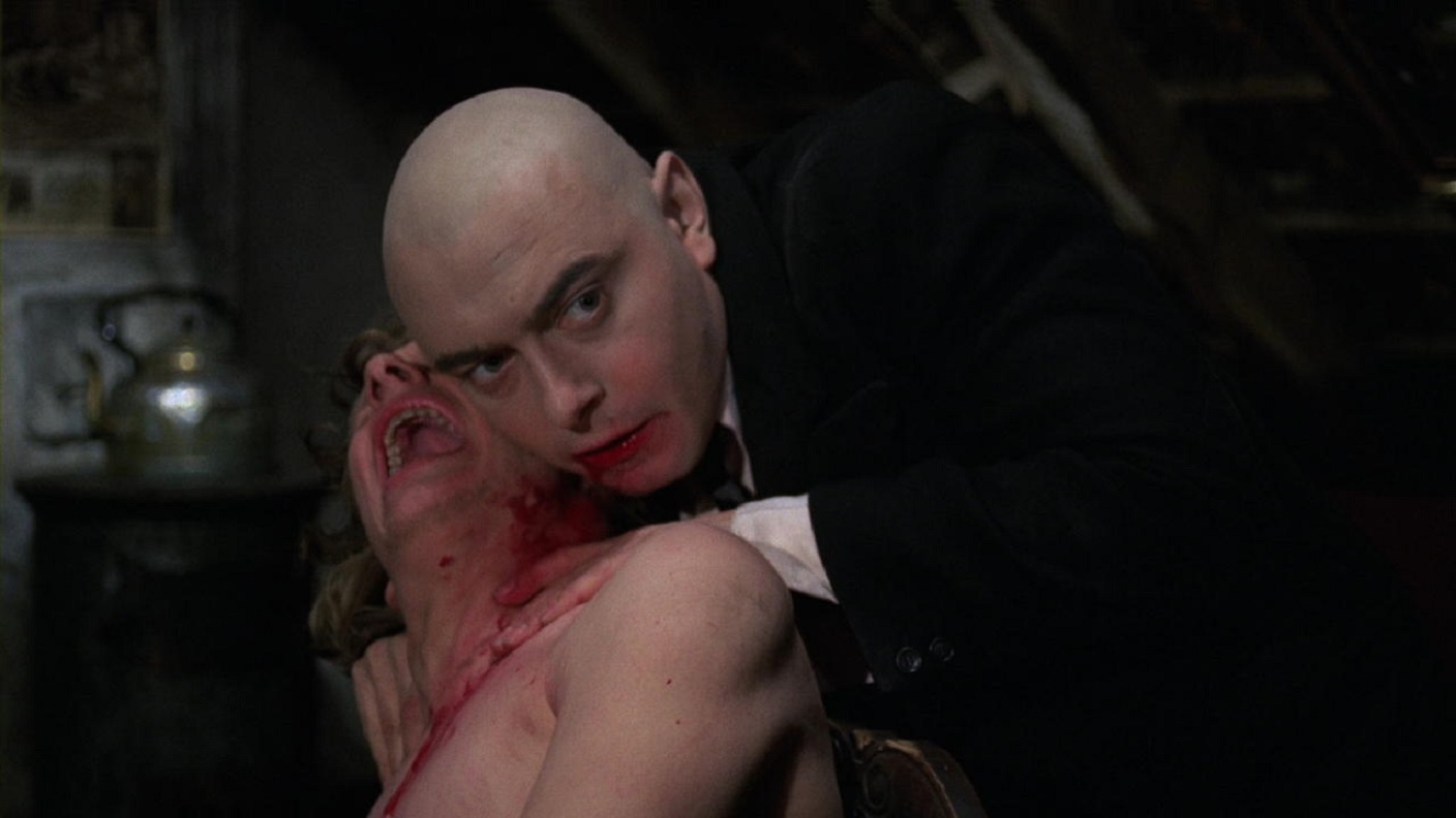 The famous image of a vampire-like Kurt Raab drinking from a victim's neck in The Tenderness of the Wolves (1973)