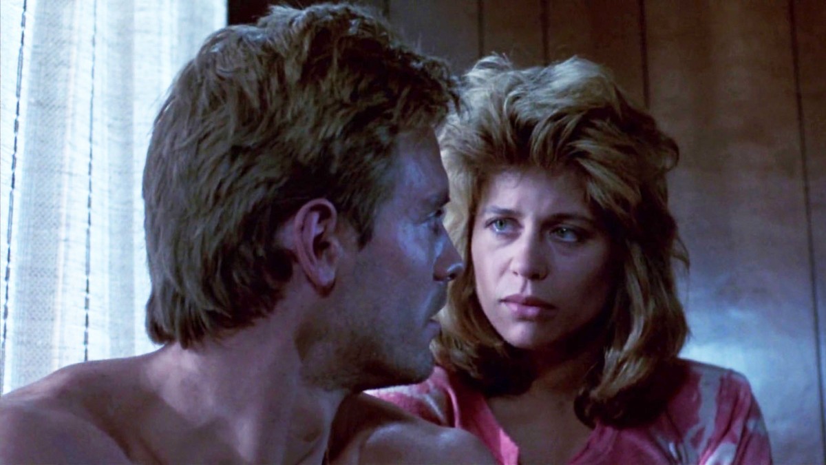Kyle Reese (Michael Biehn) and Sarah Connor (Linda Hamilton) in The Terminator (1984)