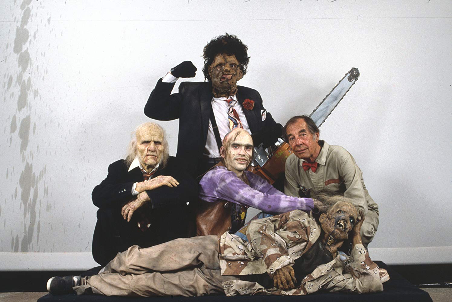 The Sawyer family - (l to r) Grandpa (Ken Evert), Leatherface (Bill Johnson), Chop-Top (Bill Moseley) and The Cook (Jim Siedow) in The Texas Chainsaw Massacre 2 (1986)