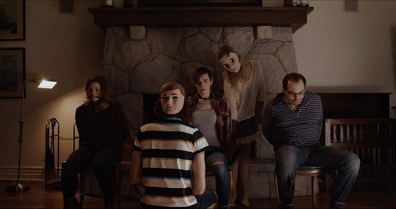 Amanda Kathleen Ward, Karli Hall, Schuyler Brumley and attackers Matthew Peschio and Alex Rinehart in They're Inside (2019)