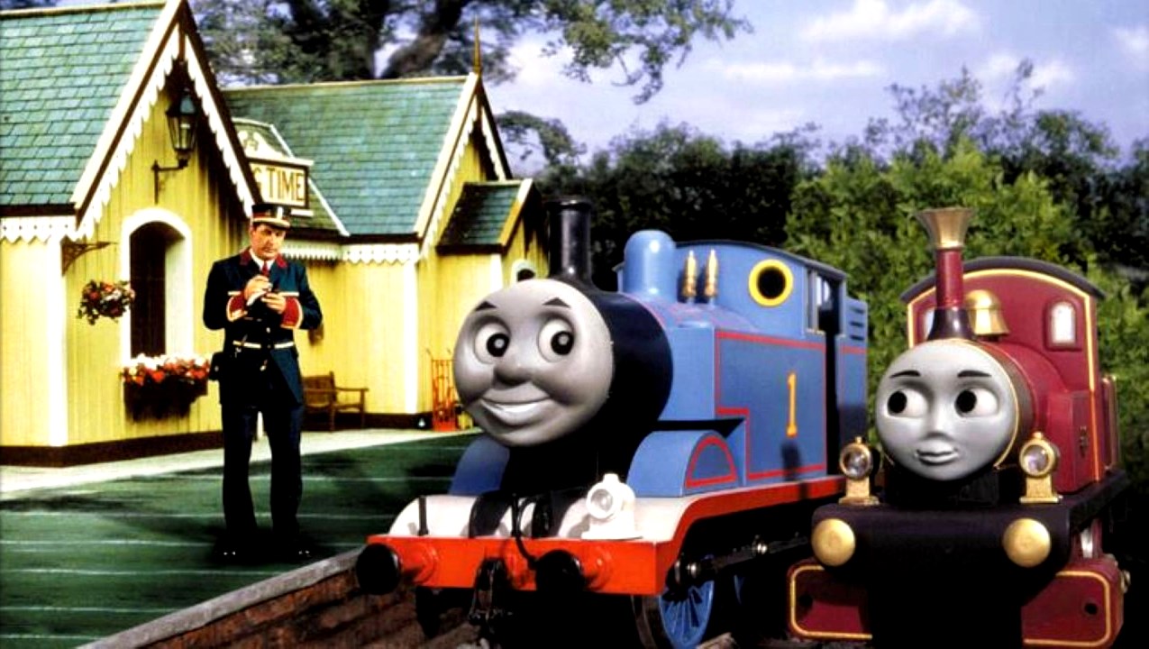 Mr Conductor (Alec Baldwin) with Thomas (voiced by Eddie Glen) and Lady (voiced by Britt Allcroft) in Thomas and the Magic Railroad (2000)