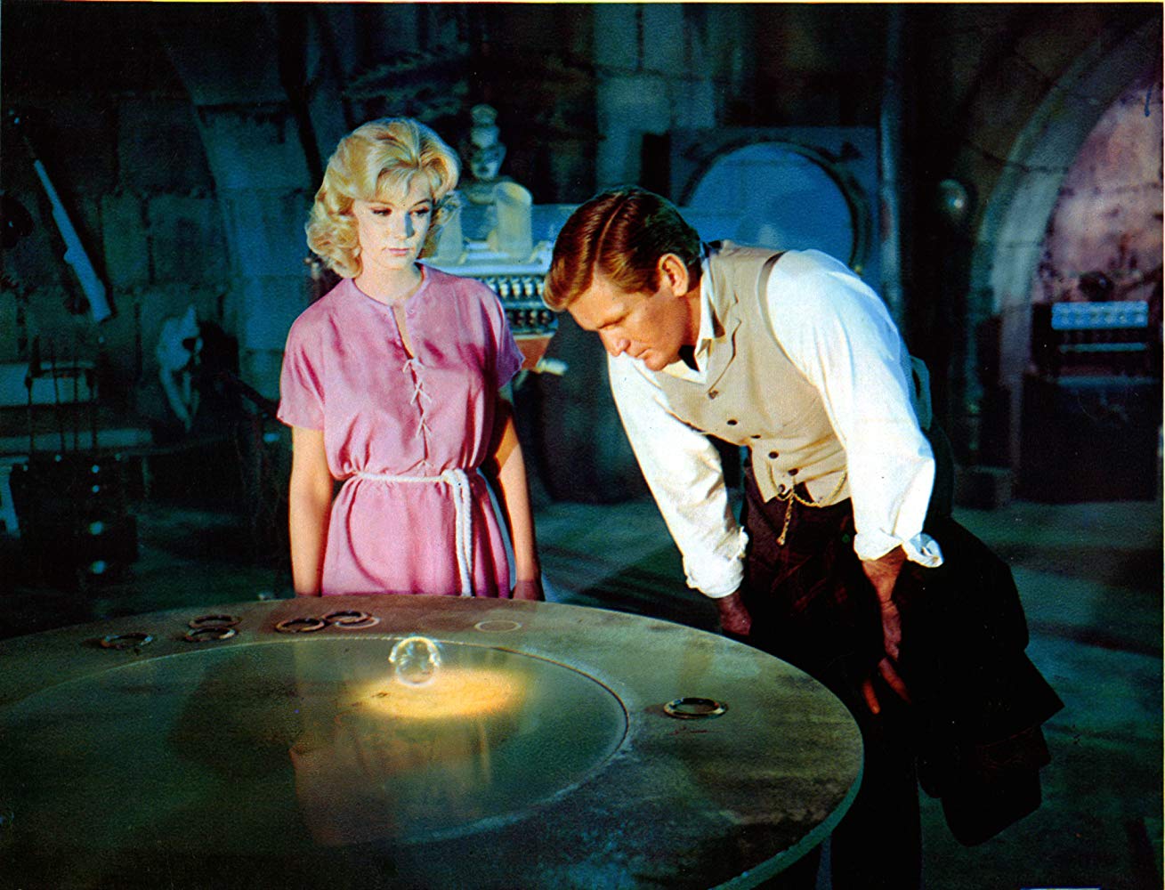 Weena (Yvette Mimieux) shows George (Rod Taylor) the history ring in The Time Machine (1960)