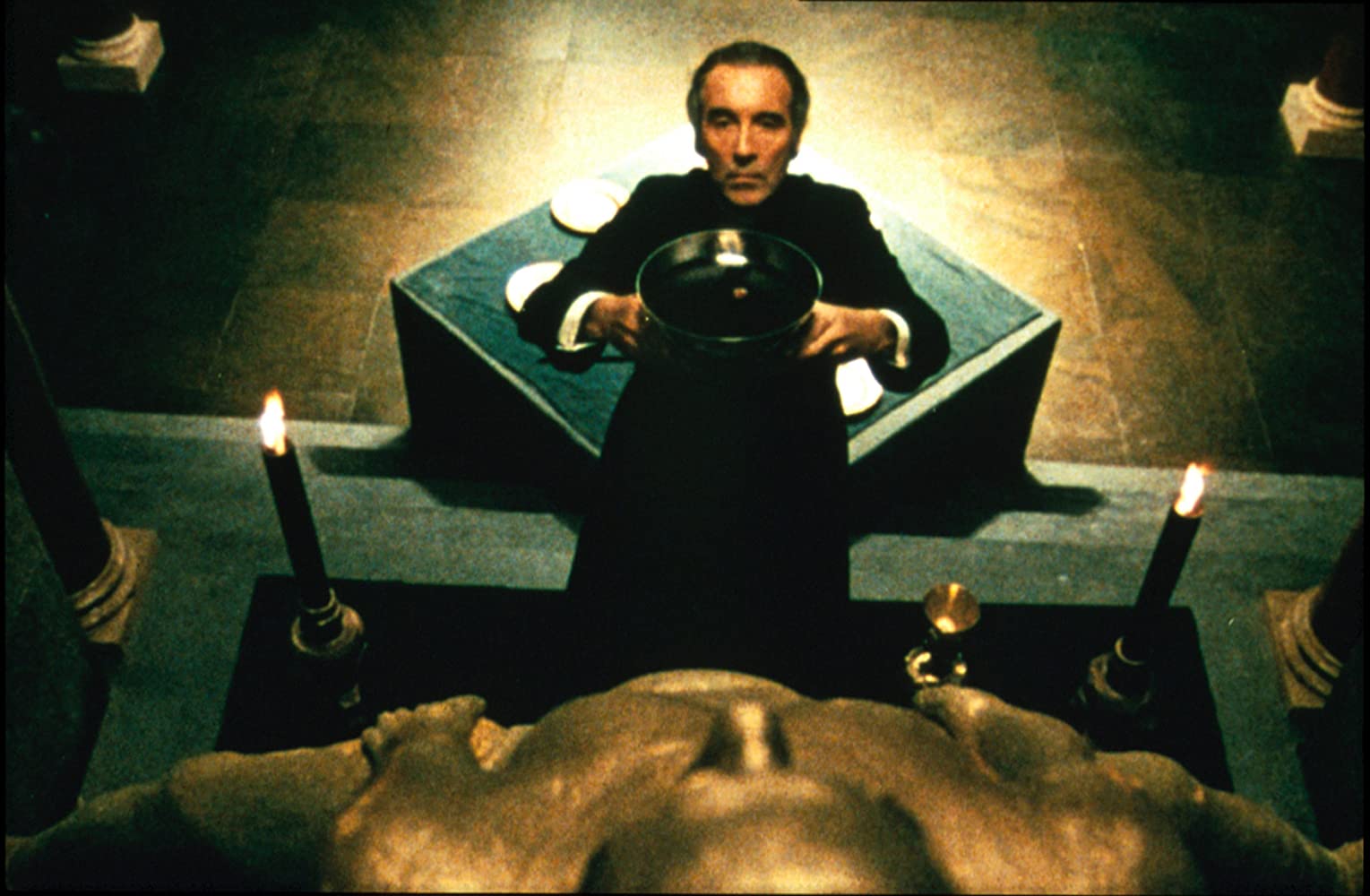 Christopher Lee conducts satanic rituals as Father Michael Rayner in To the Devil a Daughter (1976)