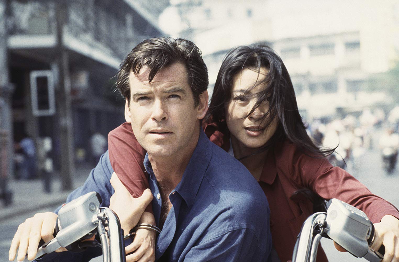 Pierce Brosnan as James Bond with Michelle Yeoh in Tomorrow Never Dies (1997)